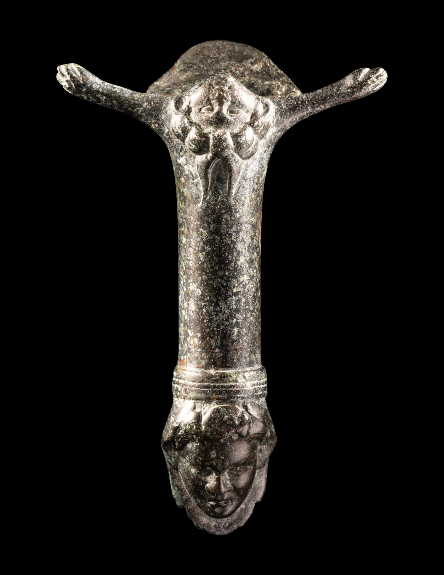 A Roman Bronze Patera Handle