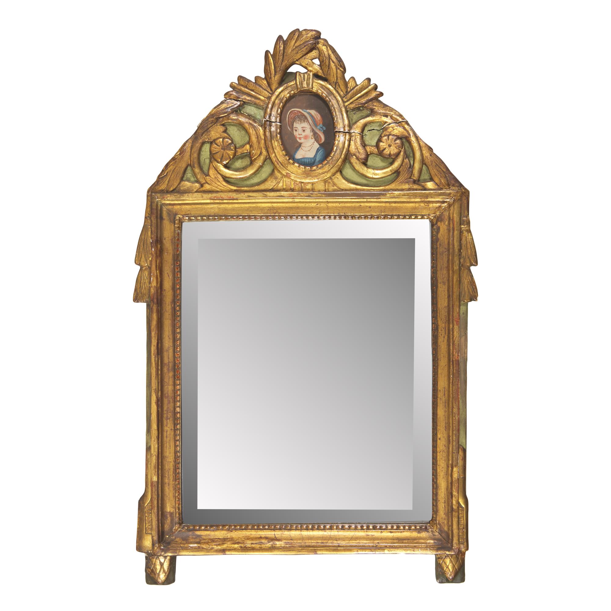 A Neoclassical Green-Painted and Parcel-Gilt Mirror Inset with Portrait of a Lady