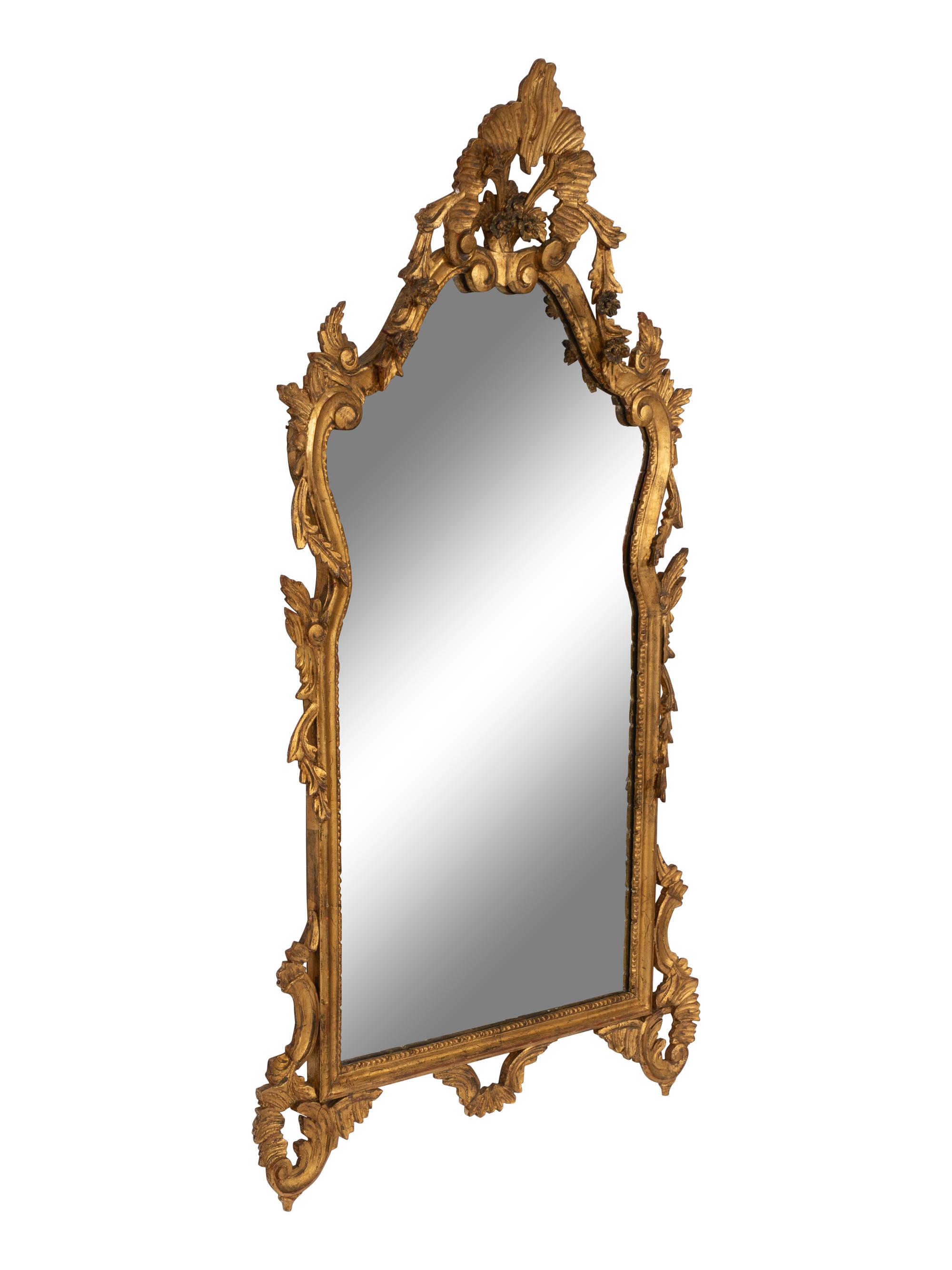 An Italian Baroque Style Giltwood Mirror