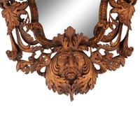 An Italian Carved Walnut Mirror in the Manner of Valentino Besarel