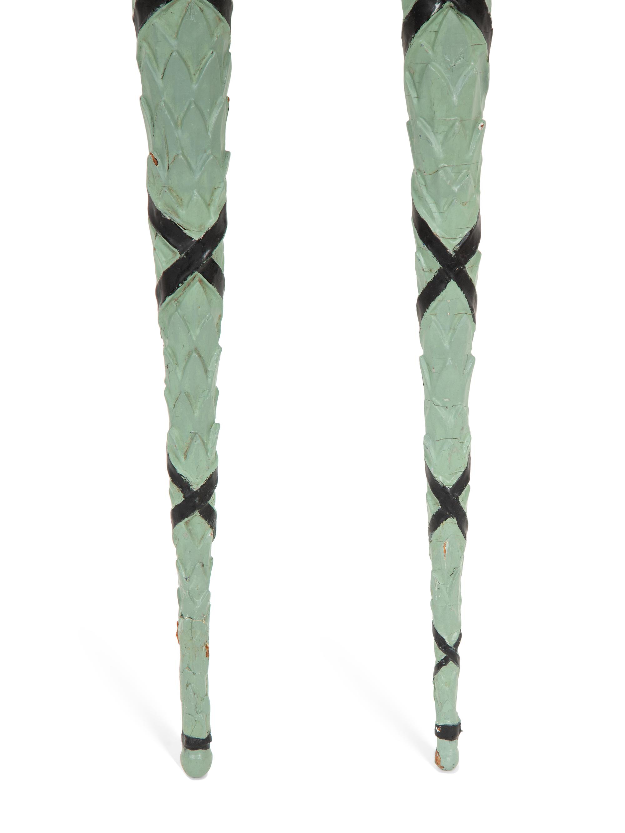 A Pair of Continental Carved and Painted Torch Wall Ornaments