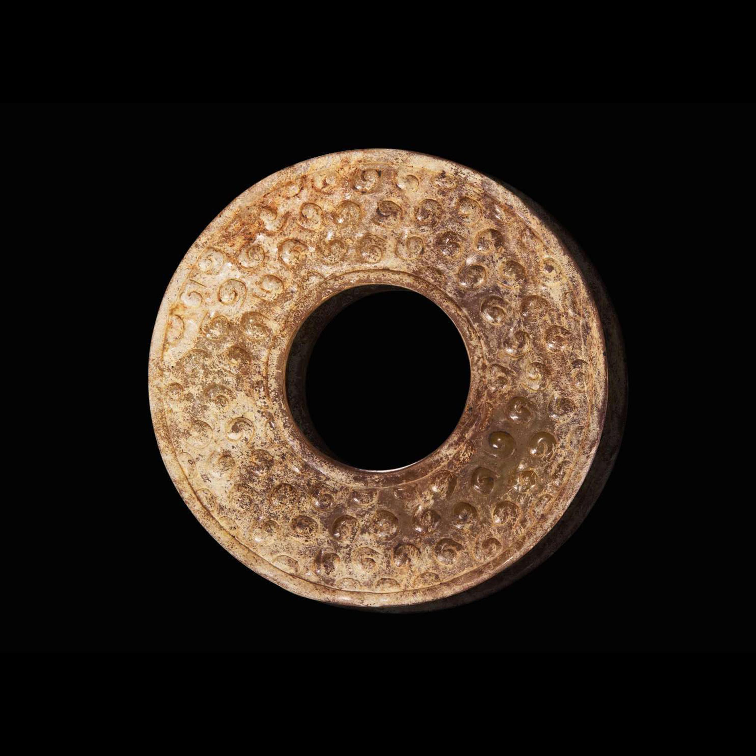 An assembled set of two small Chinese jade bi discs and a jade tube, Warring State period 戰國 玉系璧兩件及玉勒子一