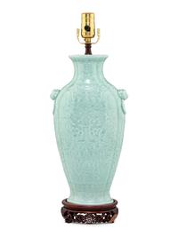 A Chinese Molded Celadon Ground Porcelain 'Phoenix' Vase