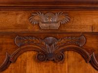 A Louis XV Walnut Two-Part Cabinet