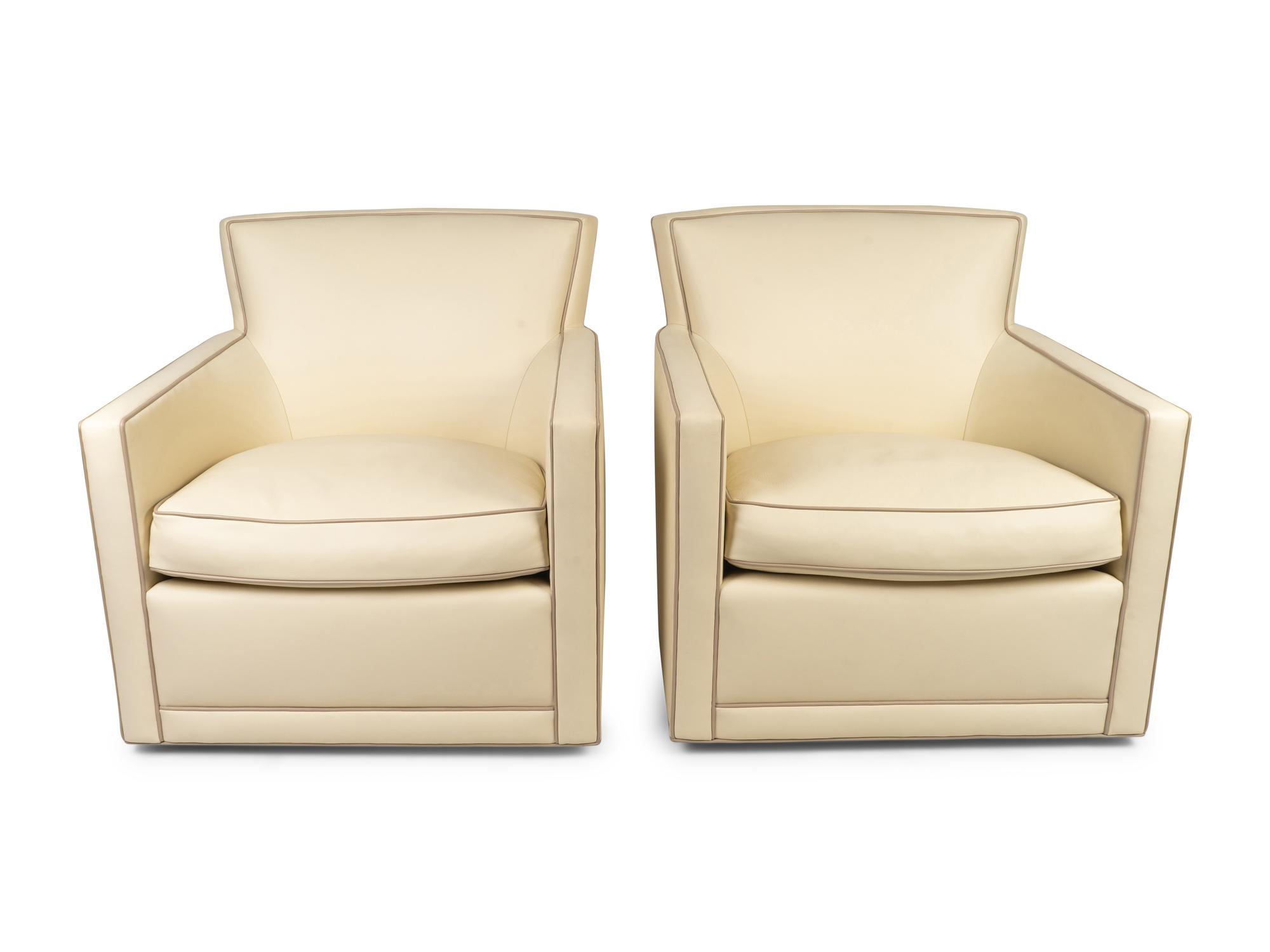 A Set of Four A. Rudin Leather Swivel Chairs — 21ST CENTURY