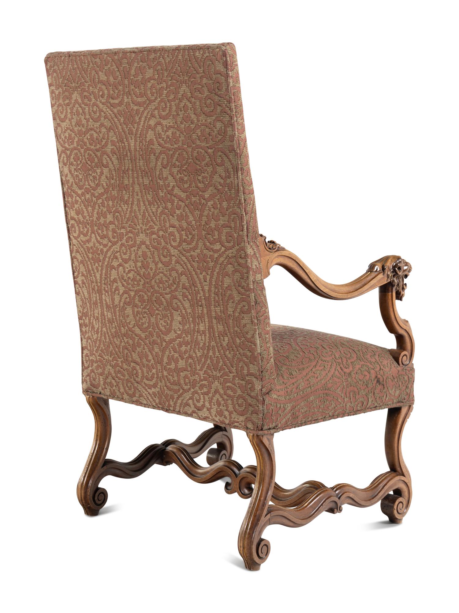 A Pair of French Carved Walnut Fauteuils