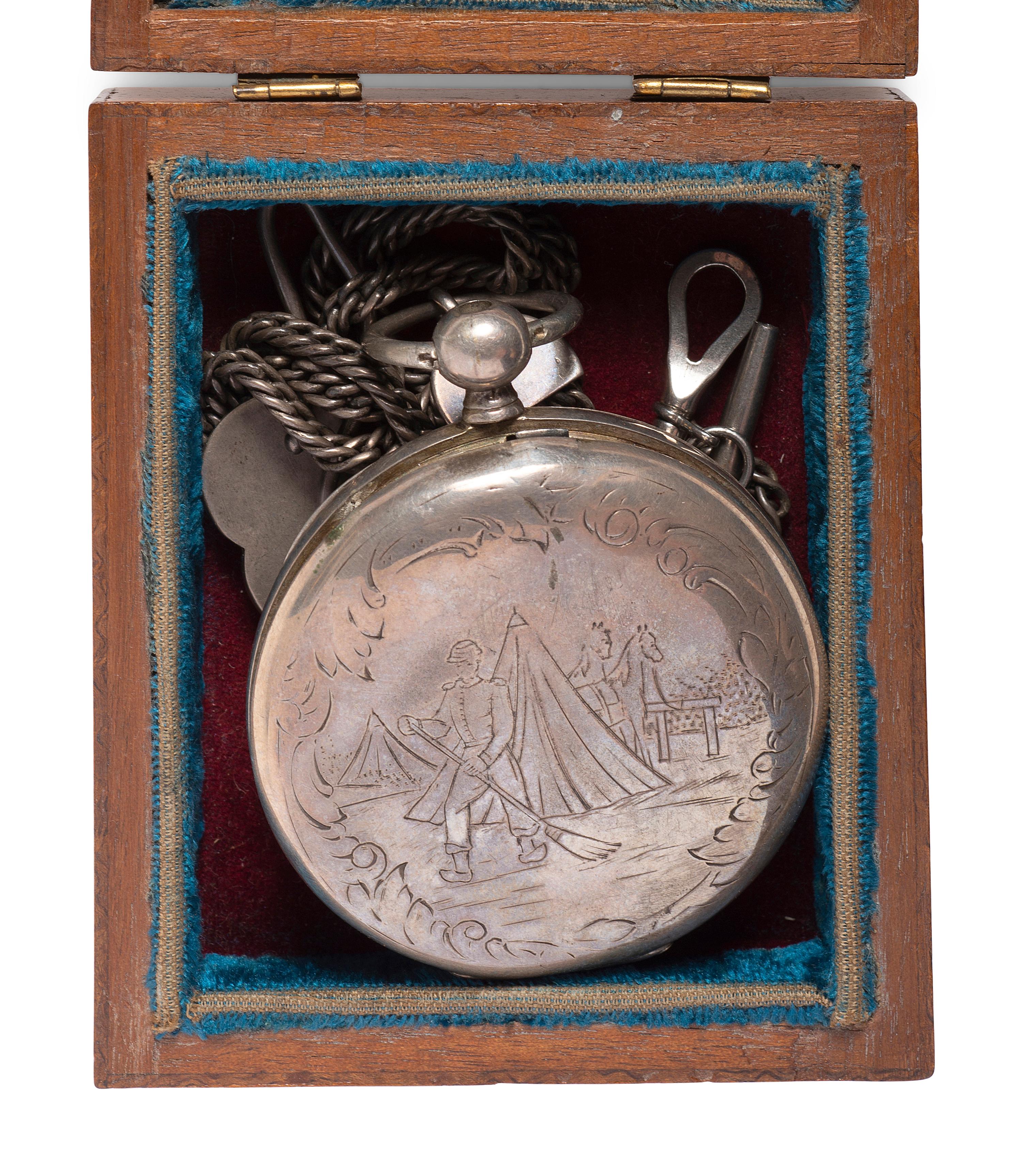 Silver patent lever pocket watch engraved with cavalry scenes.
