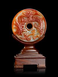 A Chinese Russet and Celadon Jade Bi Disk