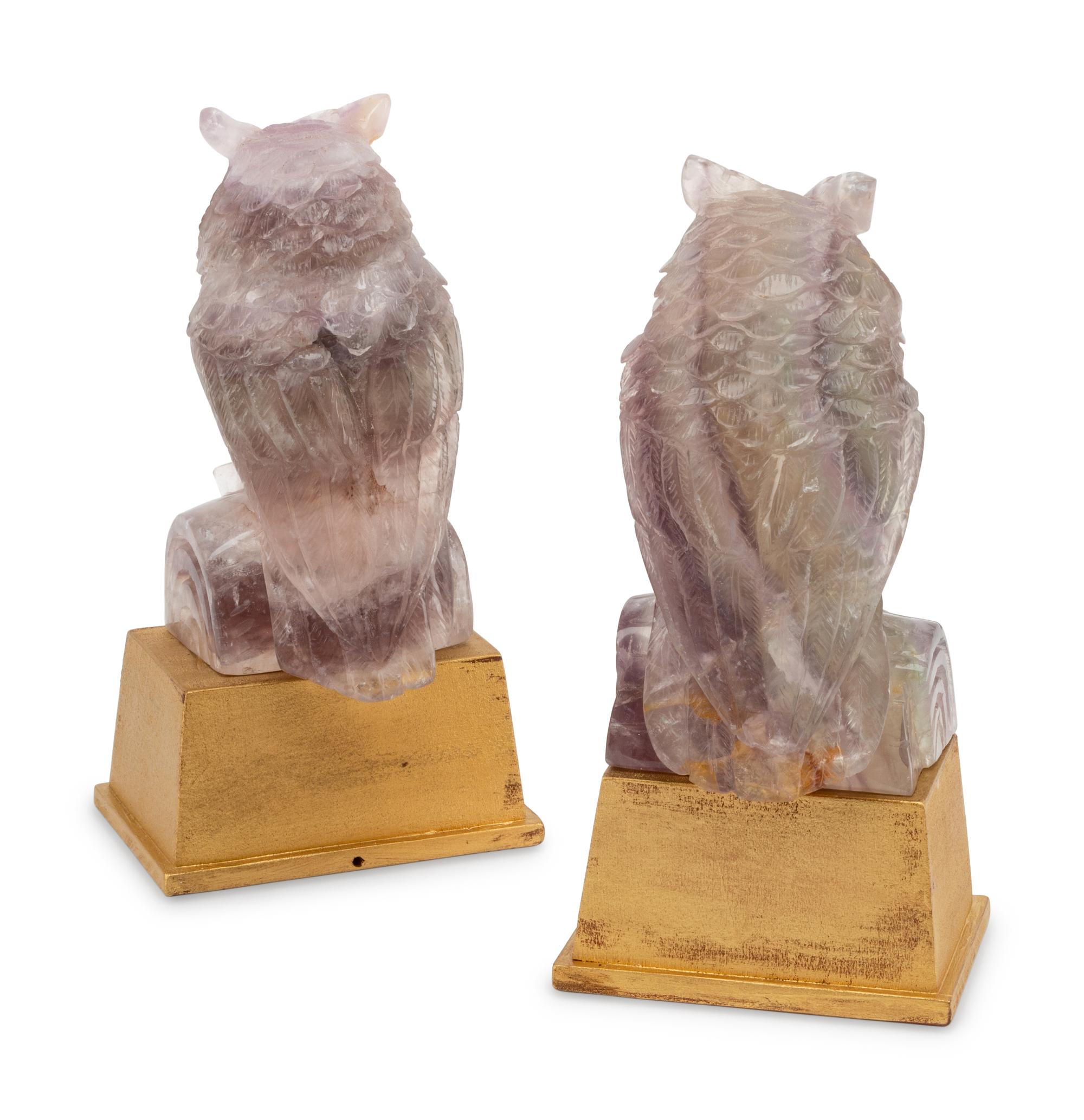 A Pair of Carved Amethyst Owls with Carved Wood Bases