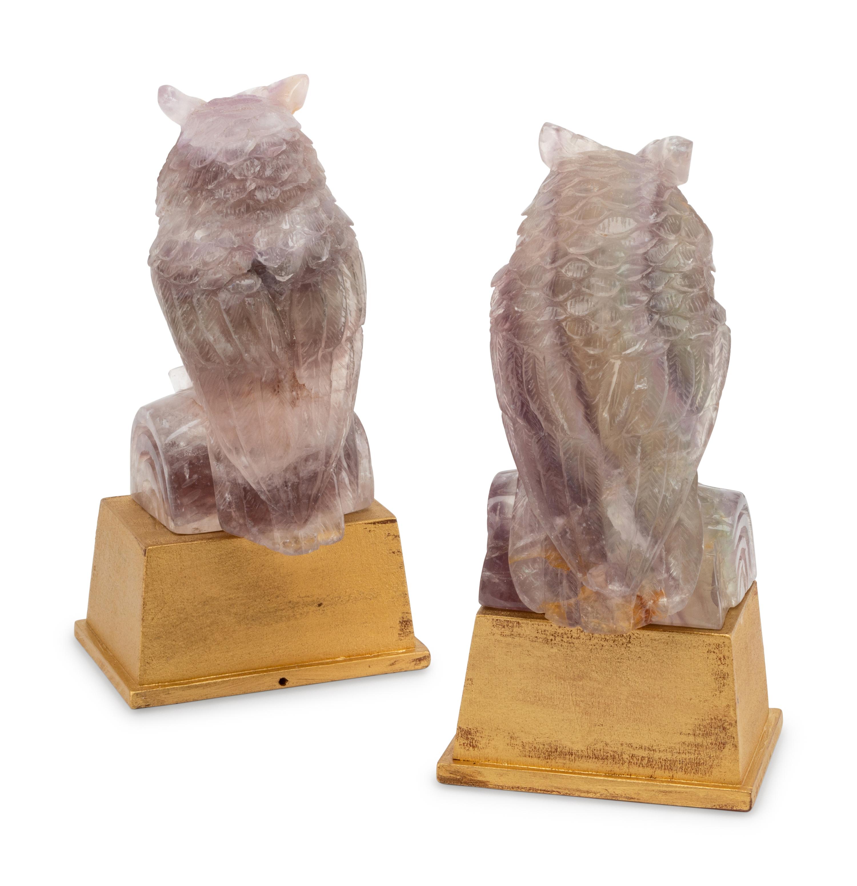 A Pair of Carved Amethyst Owls with Carved Wood Bases