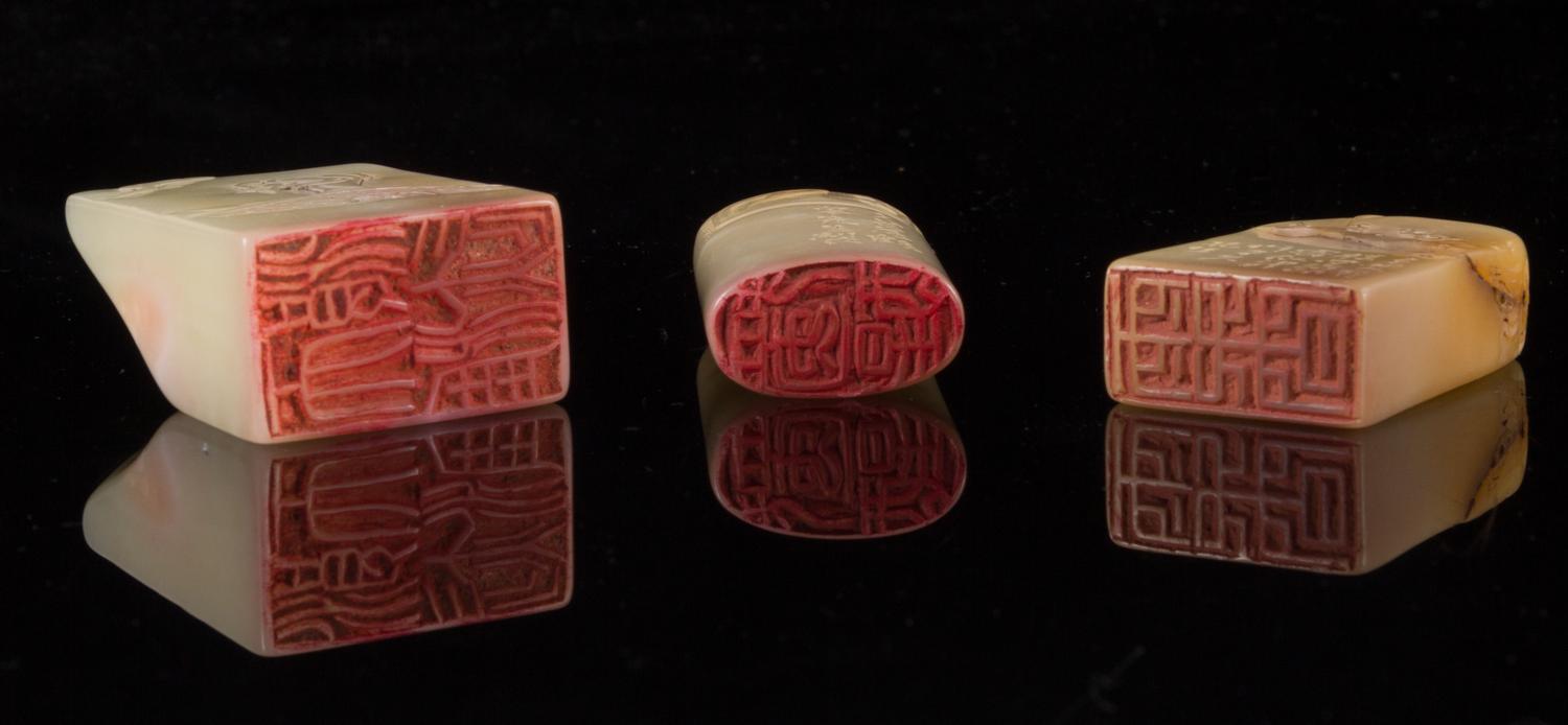Three Jade Seals Height of largest 2 inches.
