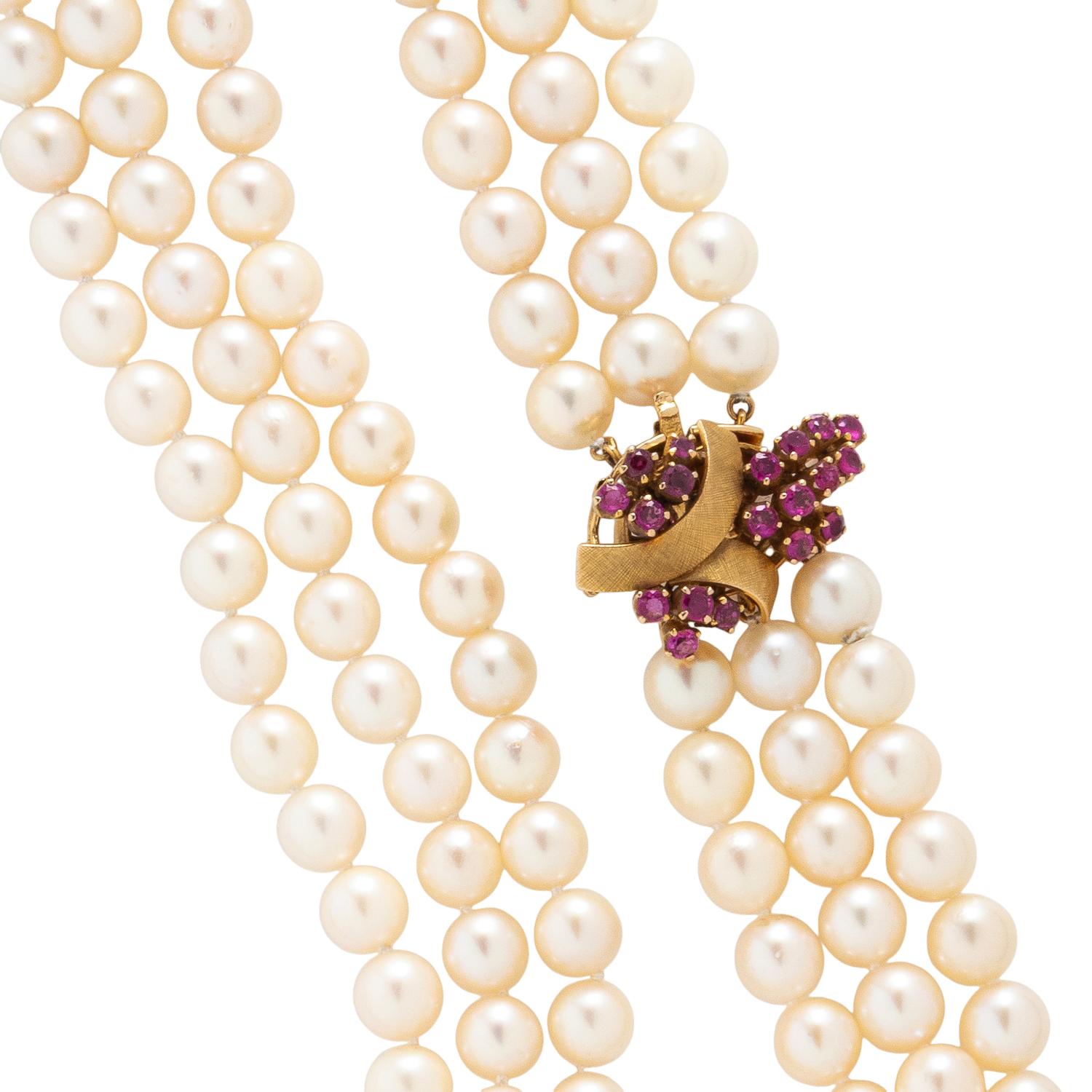 THREE STRAND CULTURED PEARL AND RUBY NECKLACE