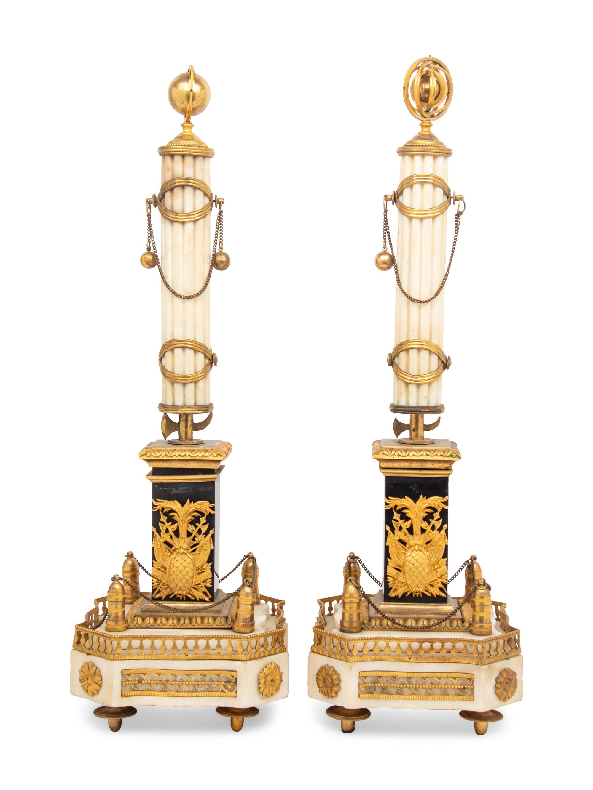 A Pair of Louis XVI Gilt Bronze Mounted Slate and White Marble Obelisks