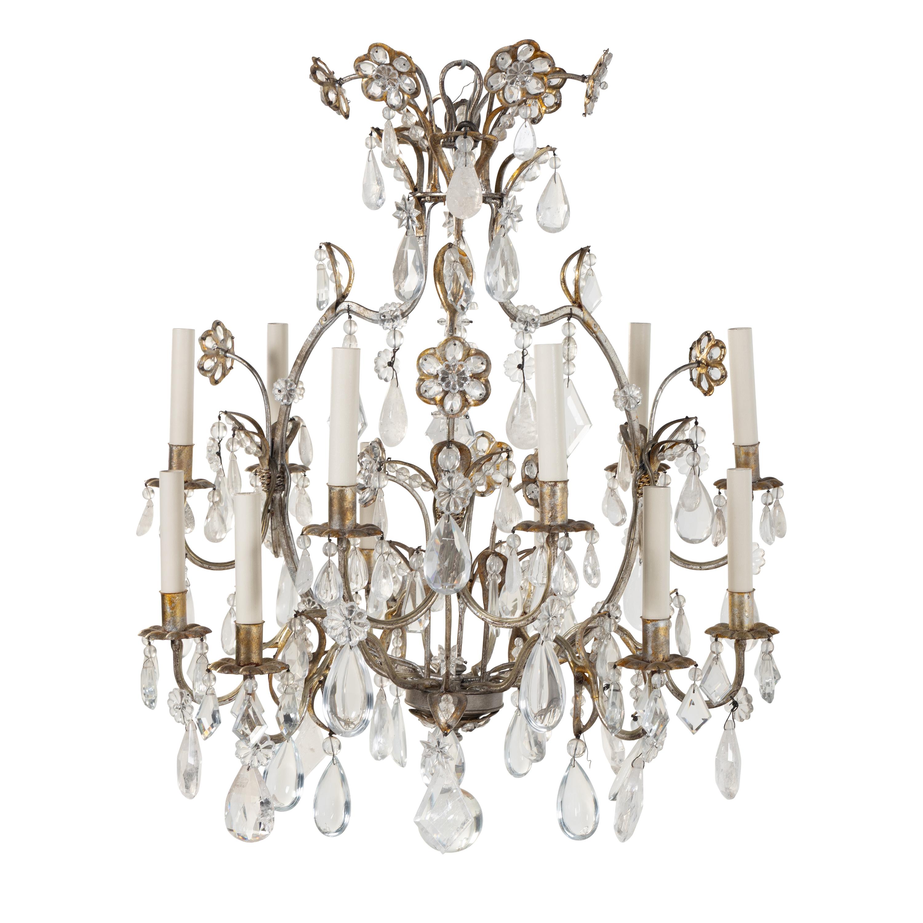 A Silvered and Gilt Metal, Cut Glass and Rock Crystal Twelve-Light Chandelier