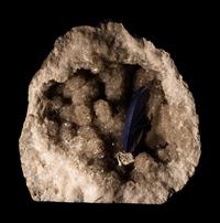 An Orthoceras and Ammonite Fossil Stone and Crystal Quartz Geode