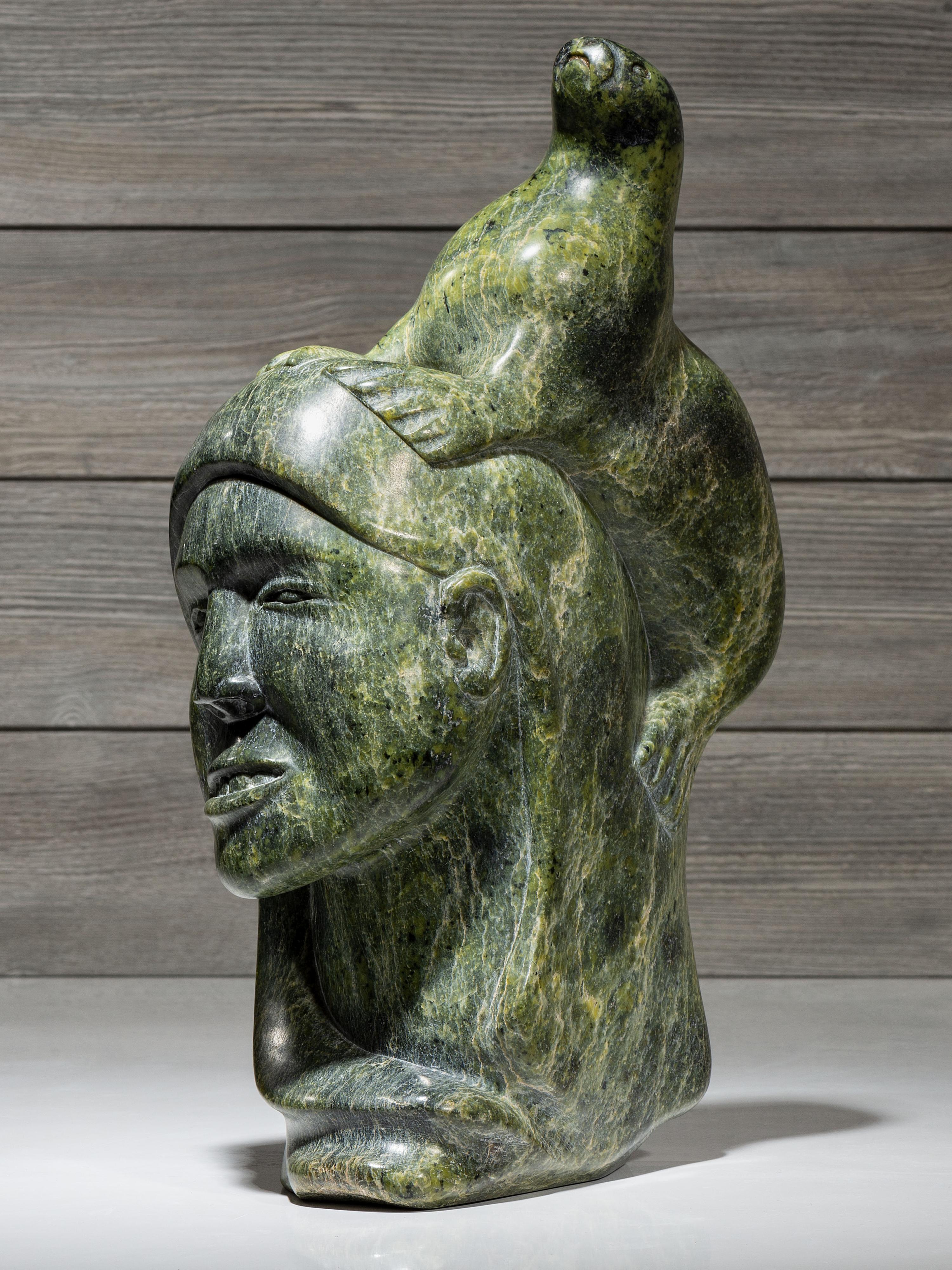 stone sculpture, woman and seal