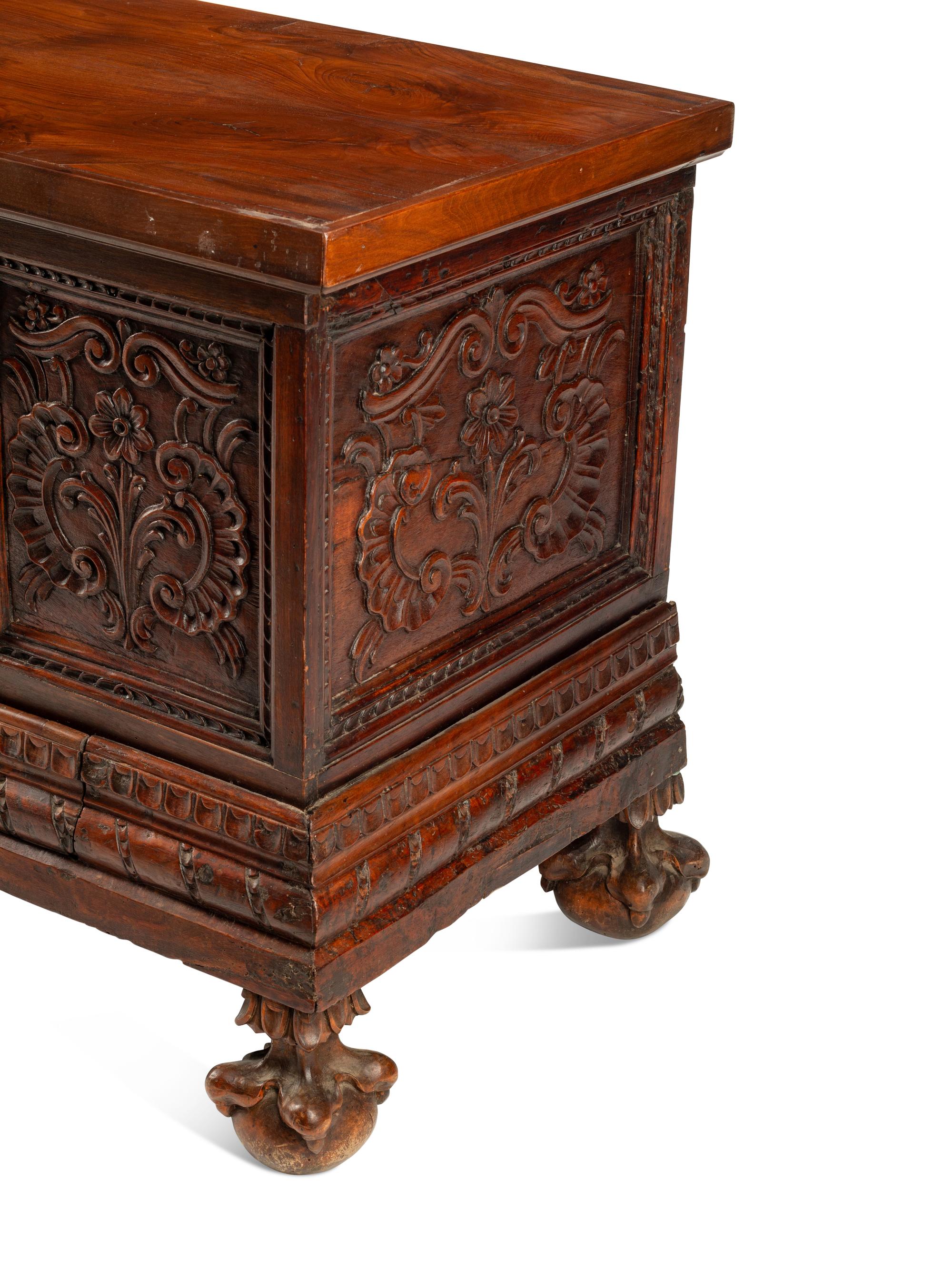 A Continental Carved Walnut Coffer