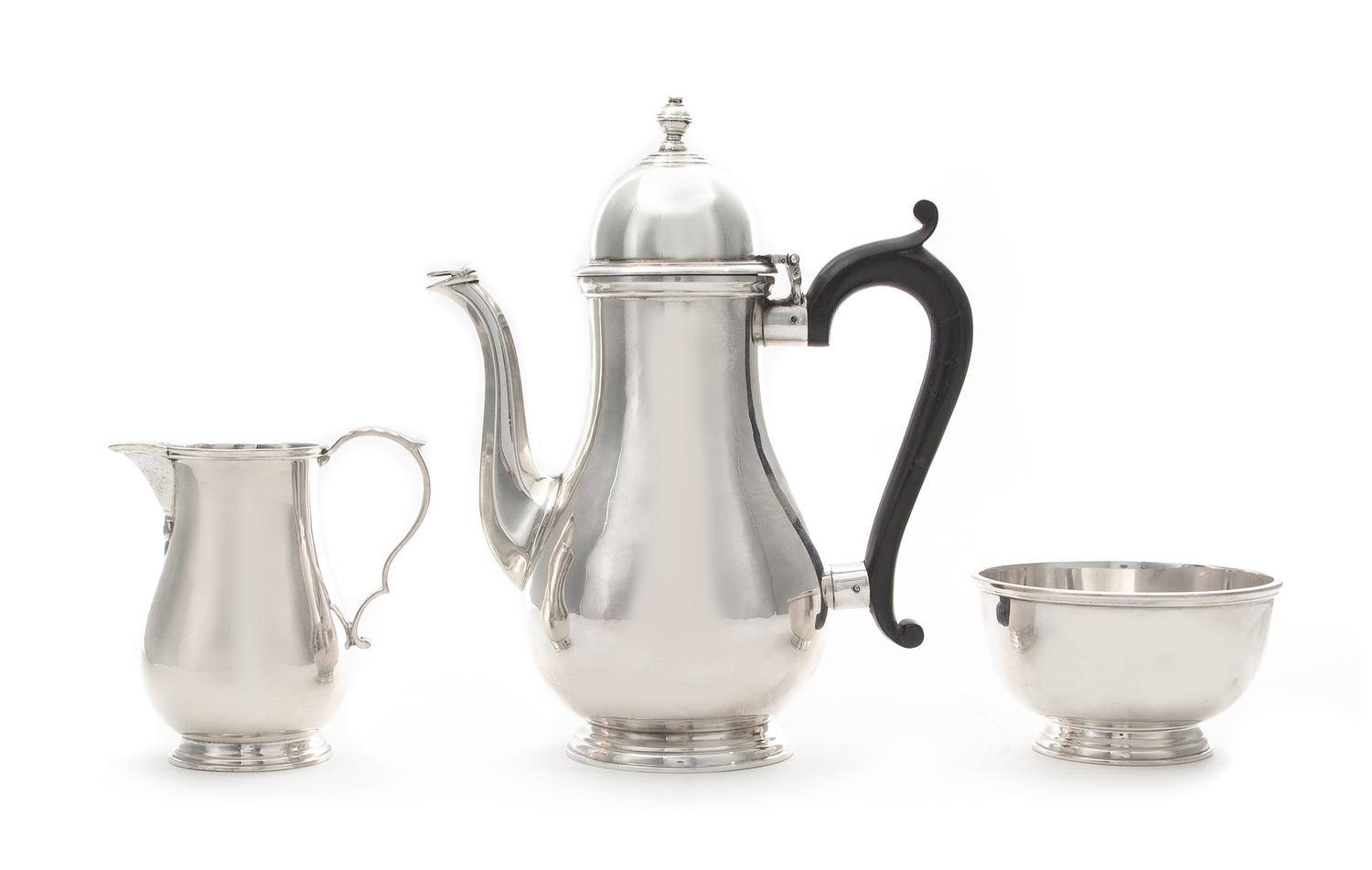An English Silver Three-Piece Bachelor's Coffee Service, Ellis Jacob Greenberg, London, 1928, Retailed by Tiffany & Co., comprising a c