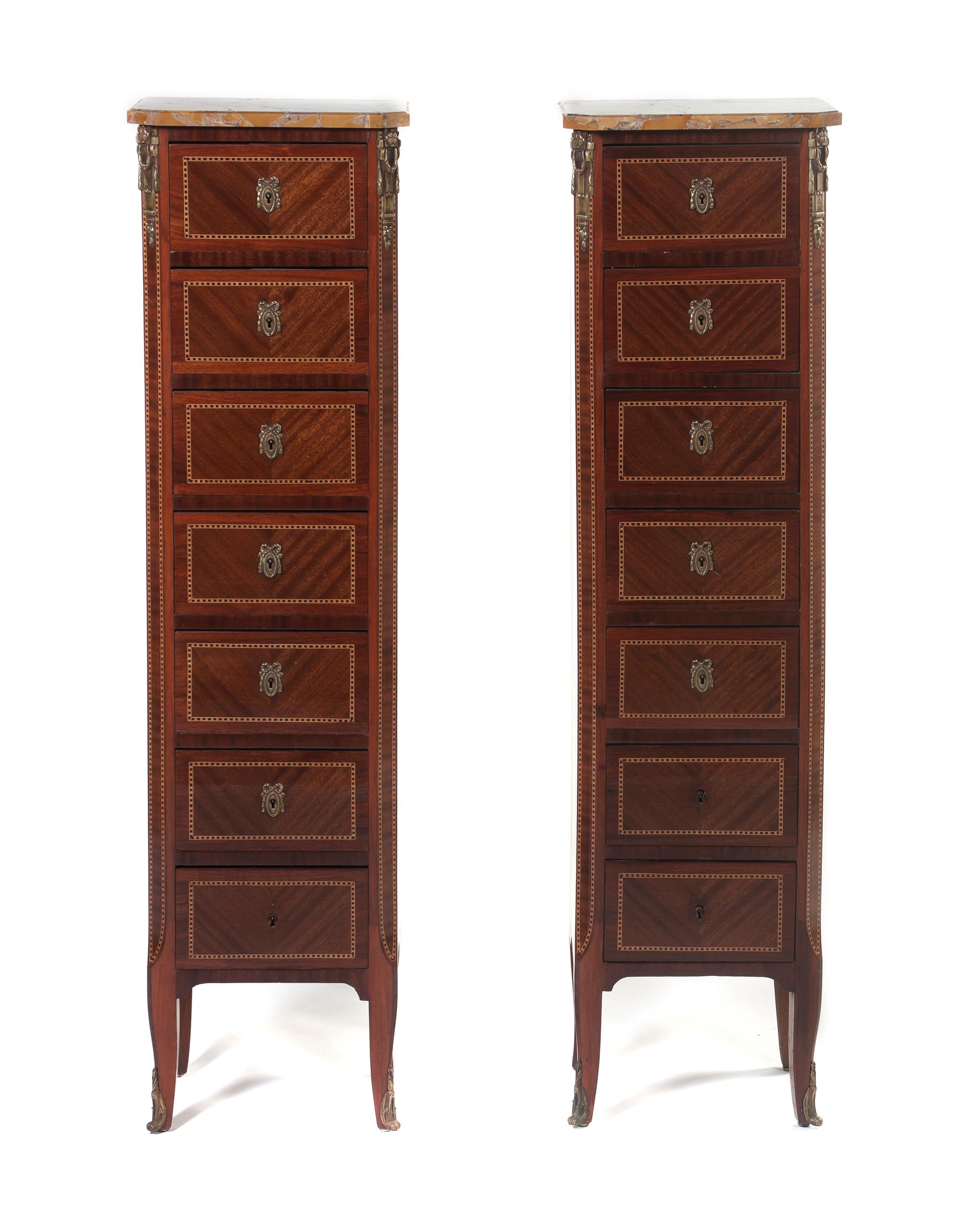 A Pair of Louis XVI Style Mahogany and Parquetry Semainiers, Height 53 x width 14 1/2 x depth 10 inches.