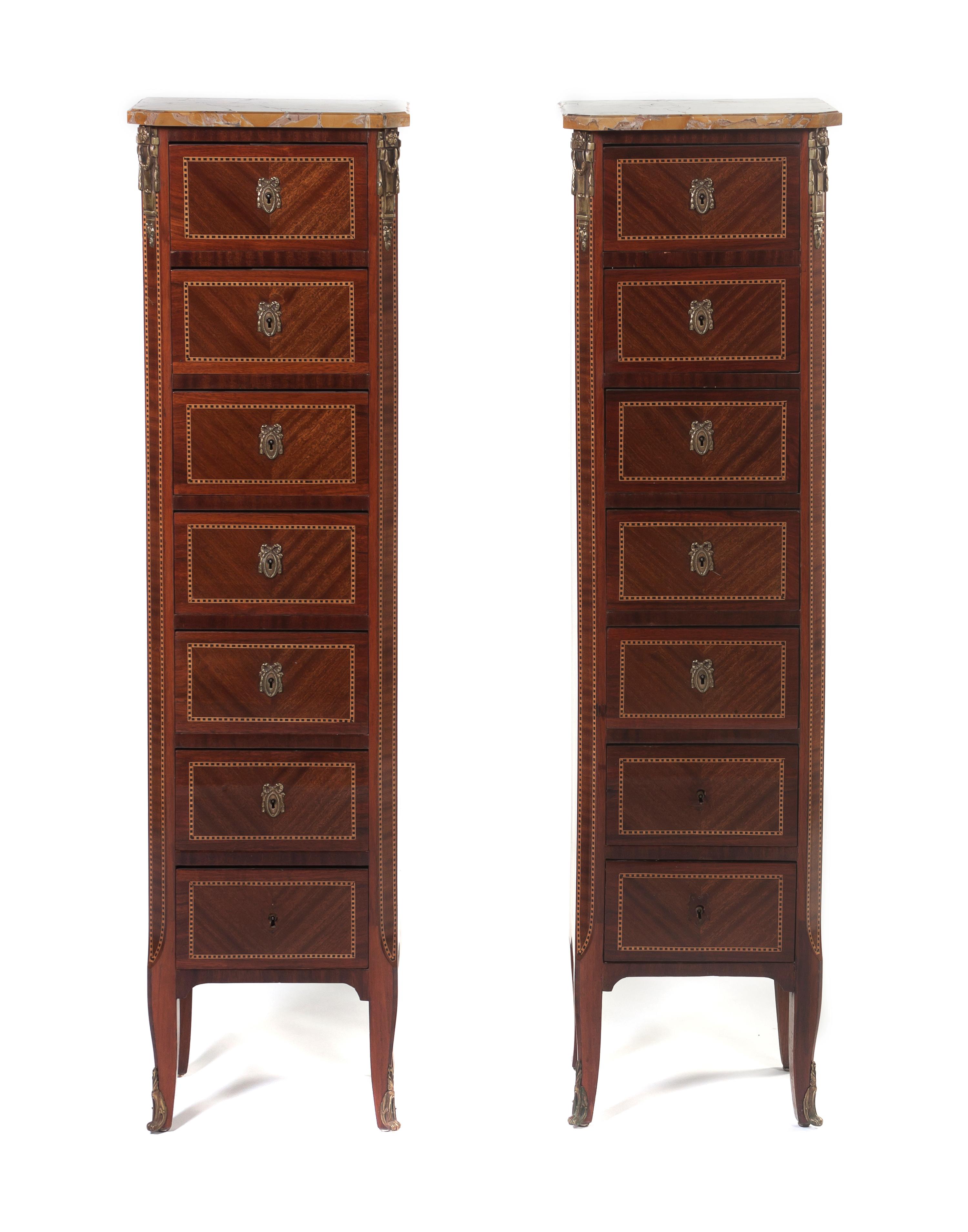 A Pair of Louis XVI Style Mahogany and Parquetry Semainiers, Height 53 x width 14 1/2 x depth 10 inches.