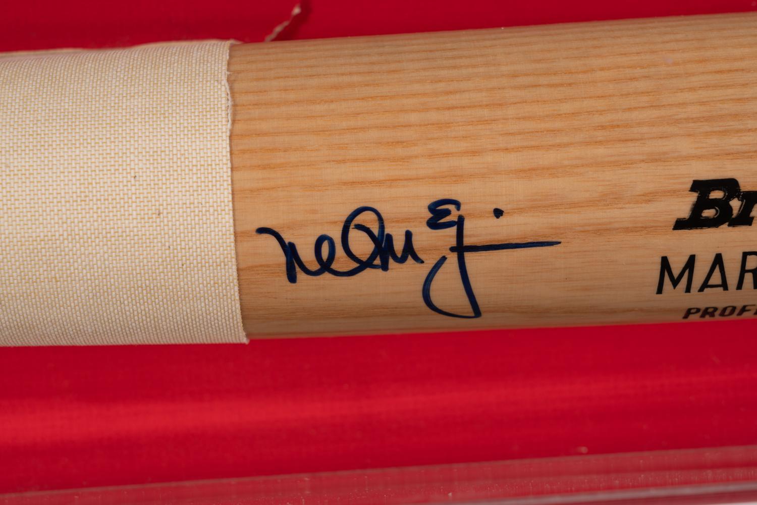 A Mark McGwire Signed Autograph Jersey and Bat Display