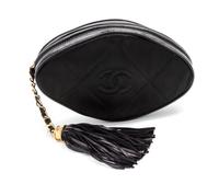 A Chanel Black Satin Quilted Clutch, 7 1/2 x 4 x 2 inches.