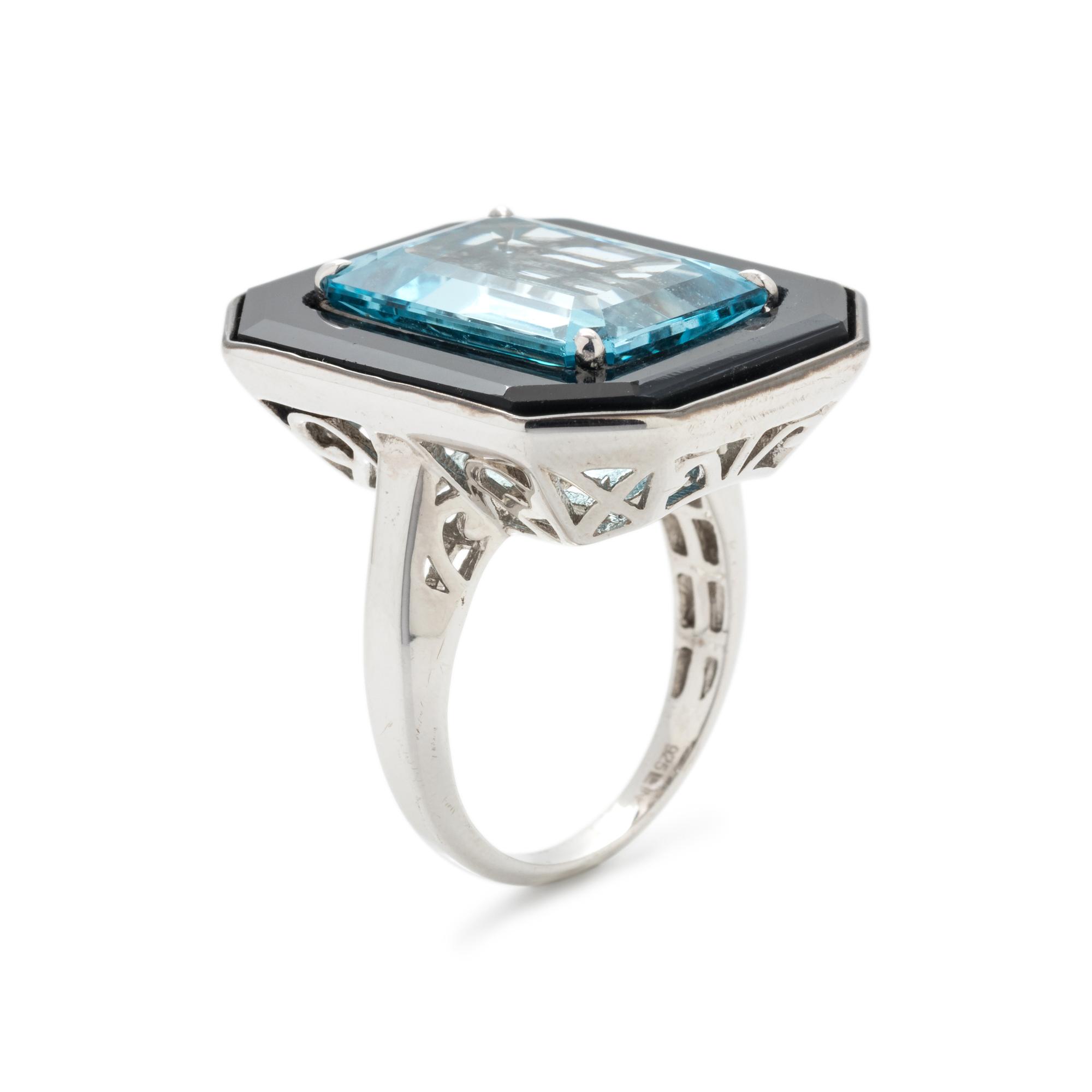 BLUE TOPAZ AND ONYX RING