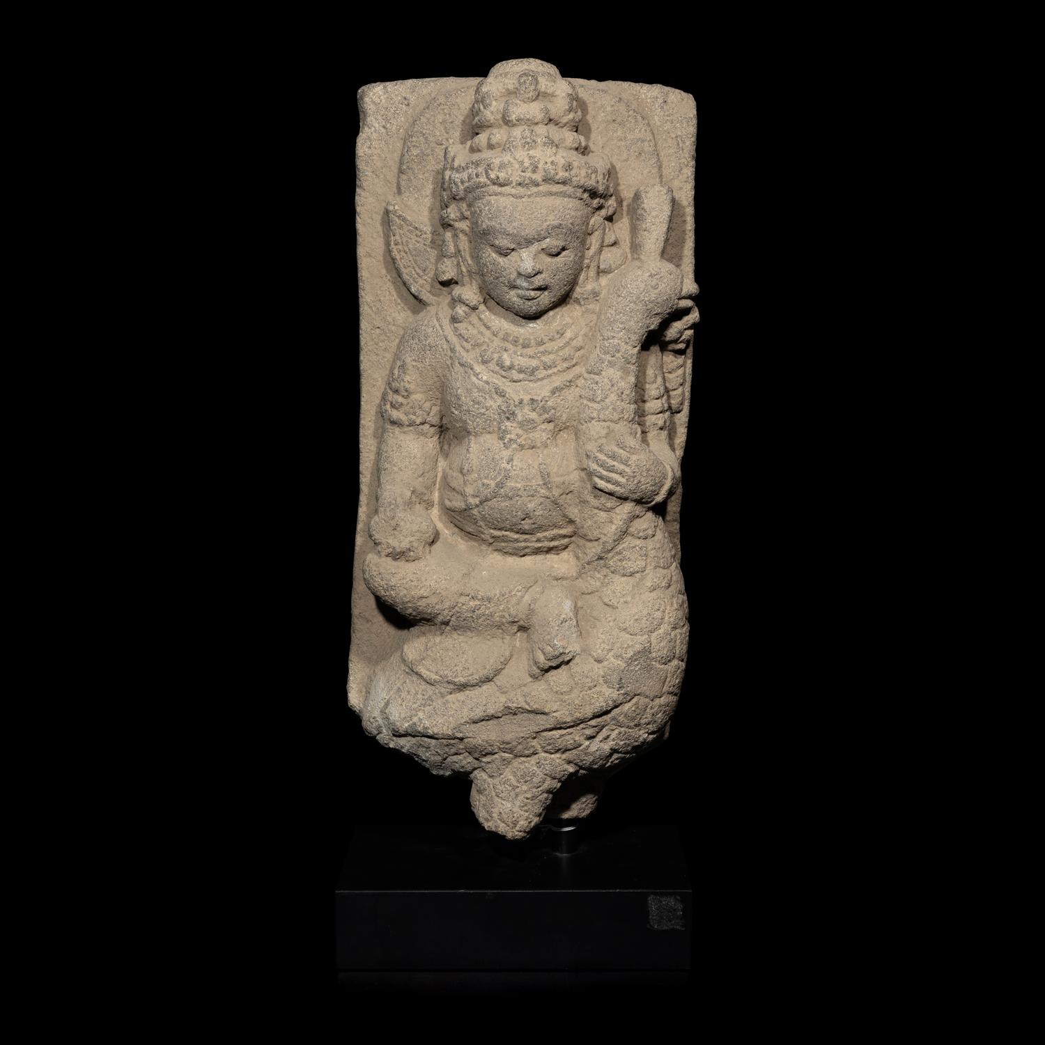 An Indonesian Volcanic Stone Figure of Kumara, Central Java, 10th Century