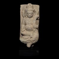 An Indonesian Volcanic Stone Figure of Kumara, Central Java, 10th Century
