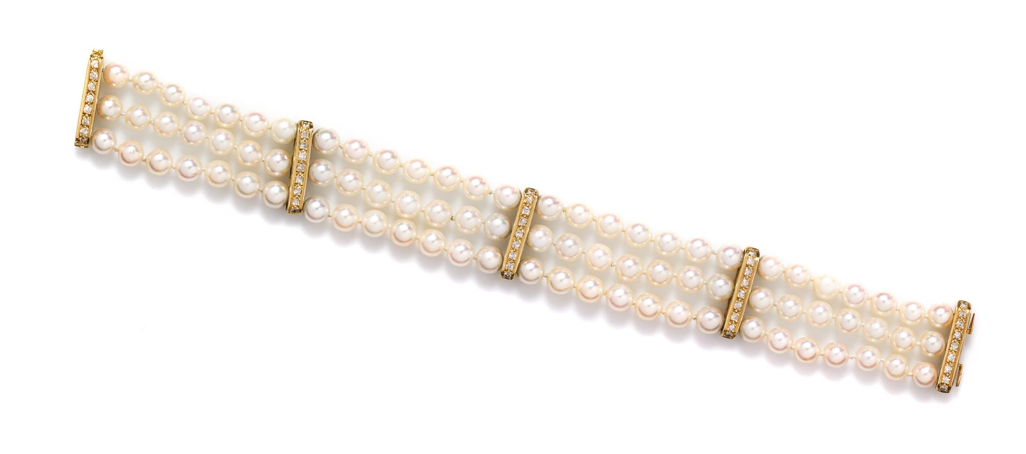 A 14 Karat Yellow Gold, Diamond and Cultured Pearl Multistrand Bracelet,