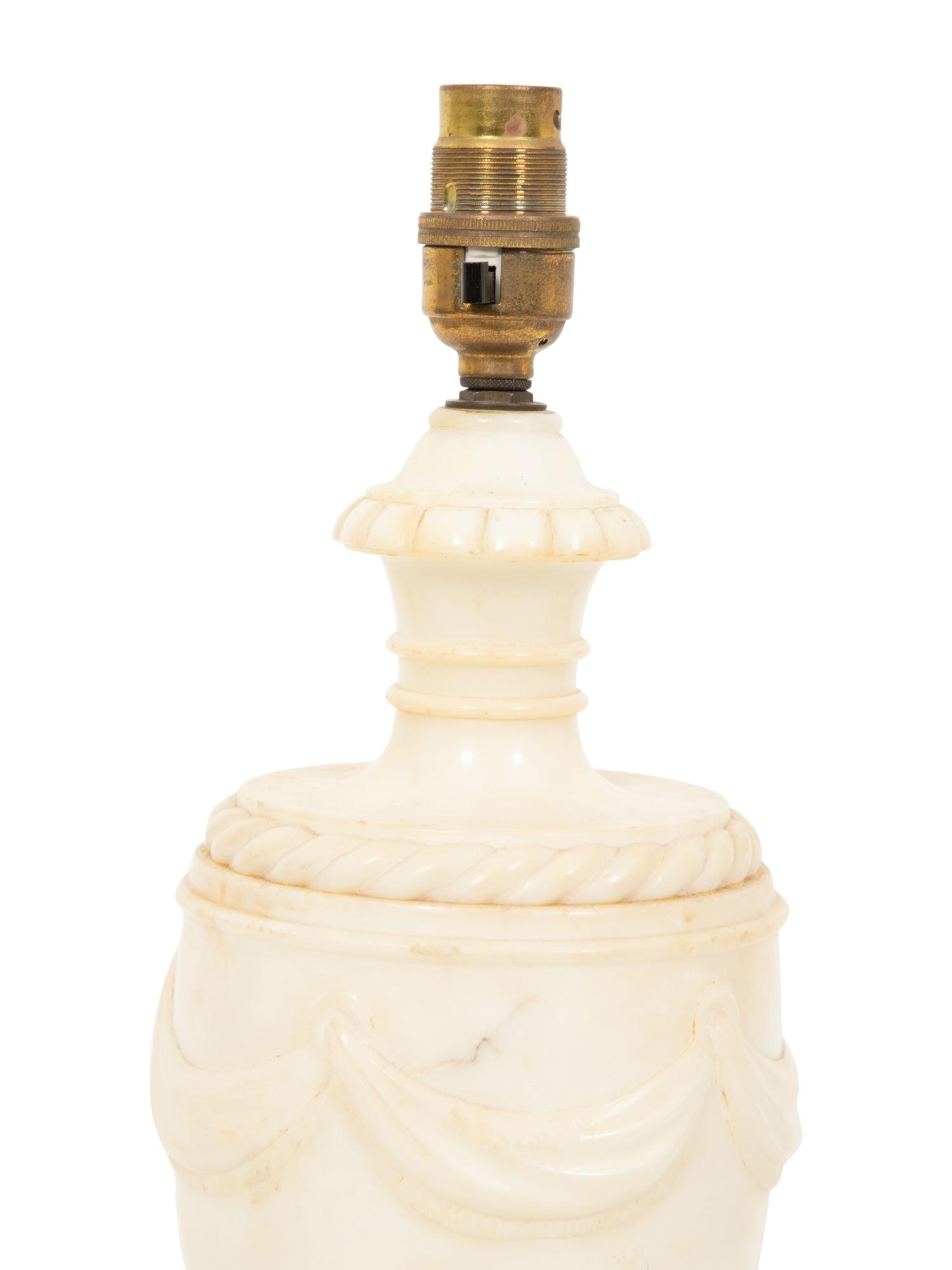 A Regency Style Carved White Marble Urn Mounted as a Lamp