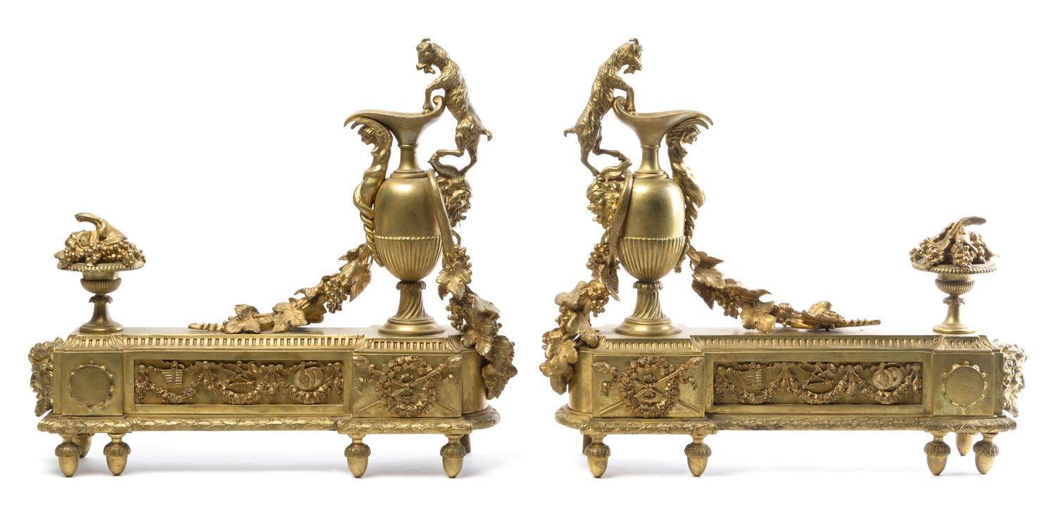 A Pair of Louis XVI Style Gilt Bronze Chenets Height 18 x width 19 inches. — 20TH CENTURY