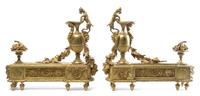 A Pair of Louis XVI Style Gilt Bronze Chenets Height 18 x width 19 inches. — 20TH CENTURY