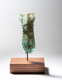A Roman Pale Blue Glass Double Unguentarium