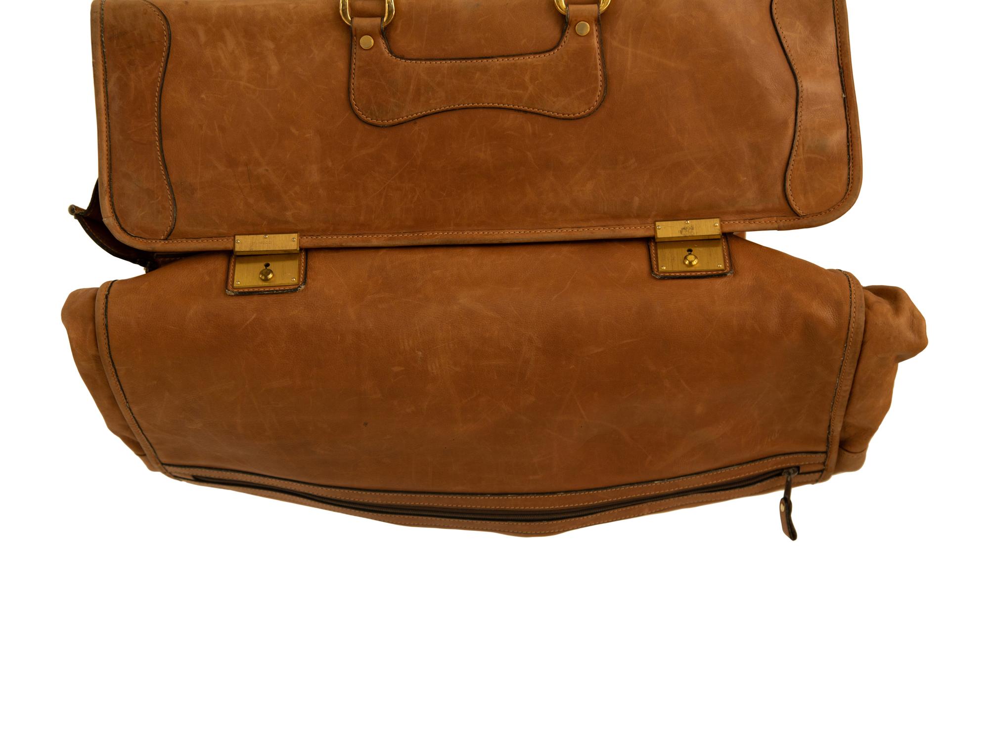 Two Bottega Veneta Suitcases and a Gucci Leather Garment Bag