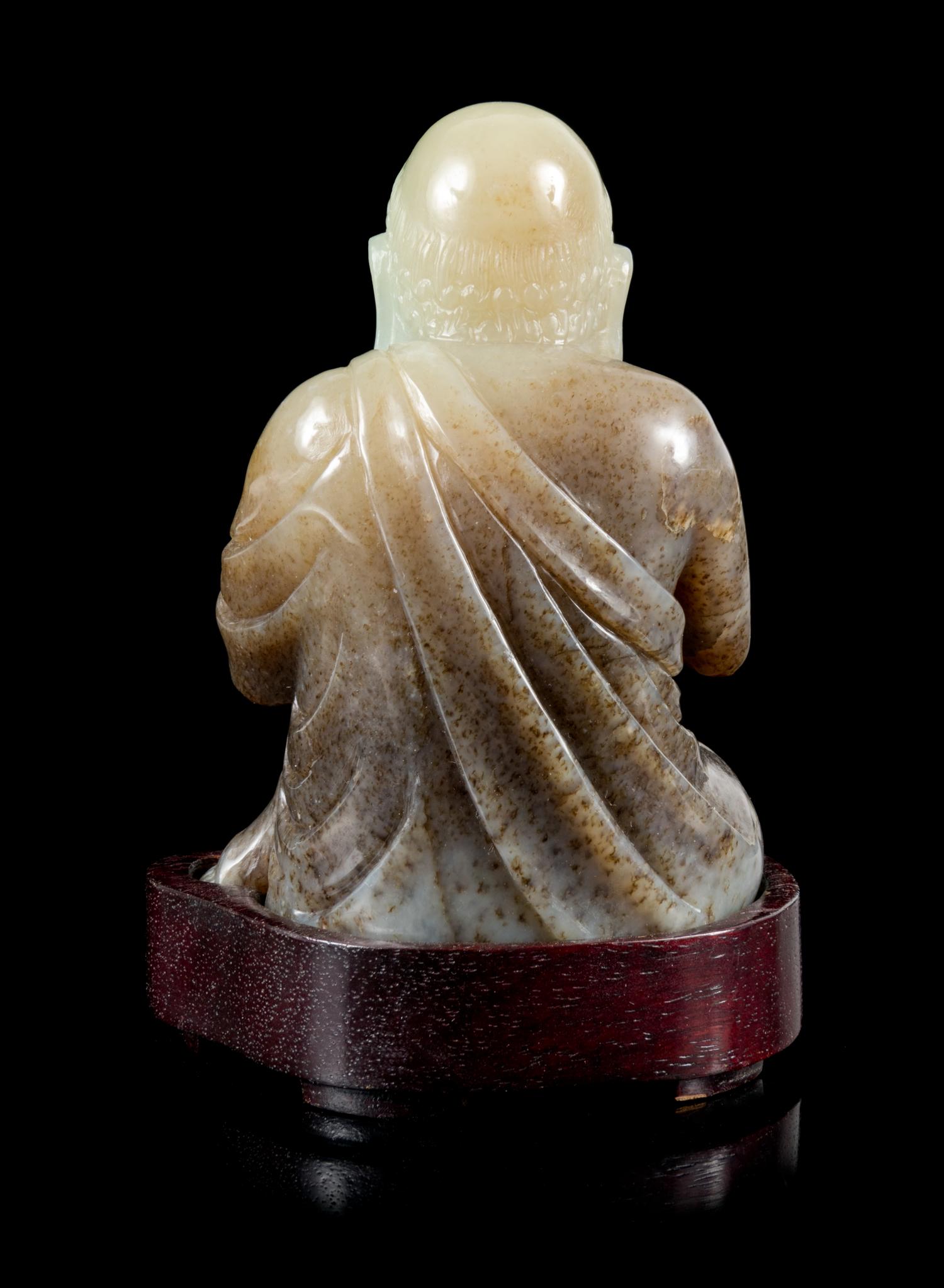A Black and White Jade Figure of a Damo Height 3 1/2 inches. — 18TH/19TH CENTURY