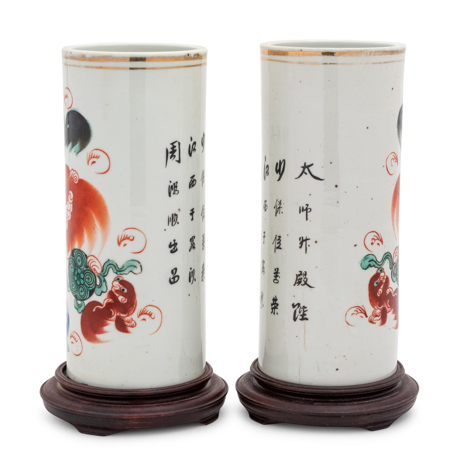 A Pair of Chinese 'Fu Lions' Porcelain Hat Stands