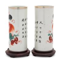 A Pair of Chinese 'Fu Lions' Porcelain Hat Stands