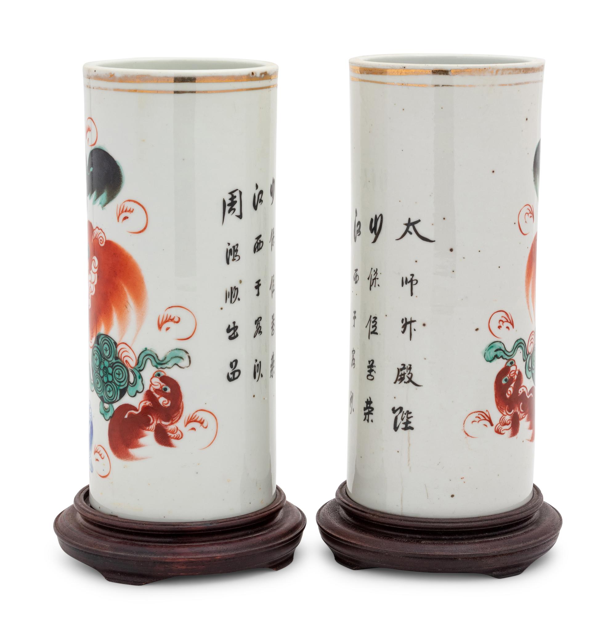 A Pair of Chinese 'Fu Lions' Porcelain Hat Stands