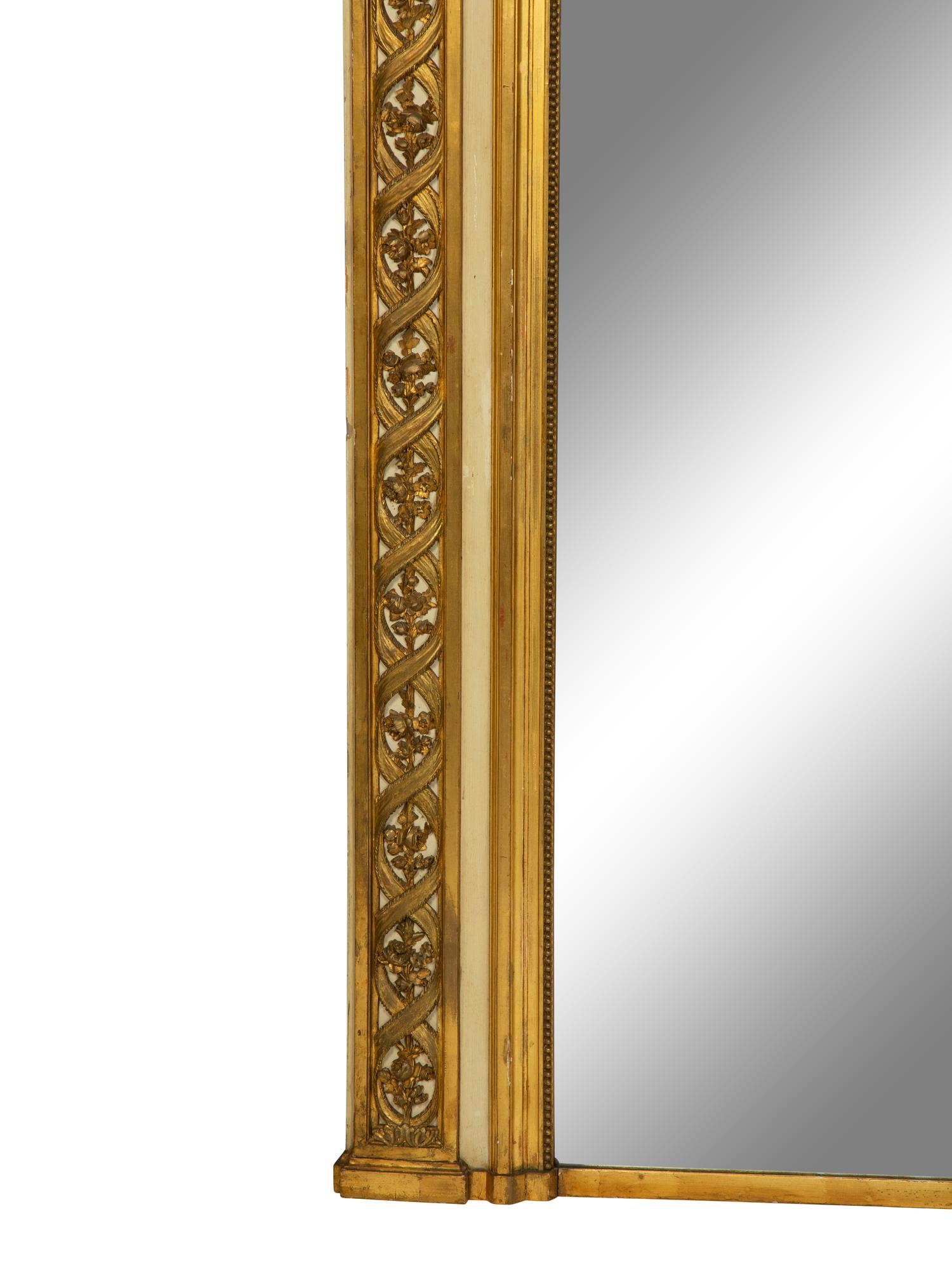 A Louis XVI Style Painted and Parcel Gilt Overmantel Mirror