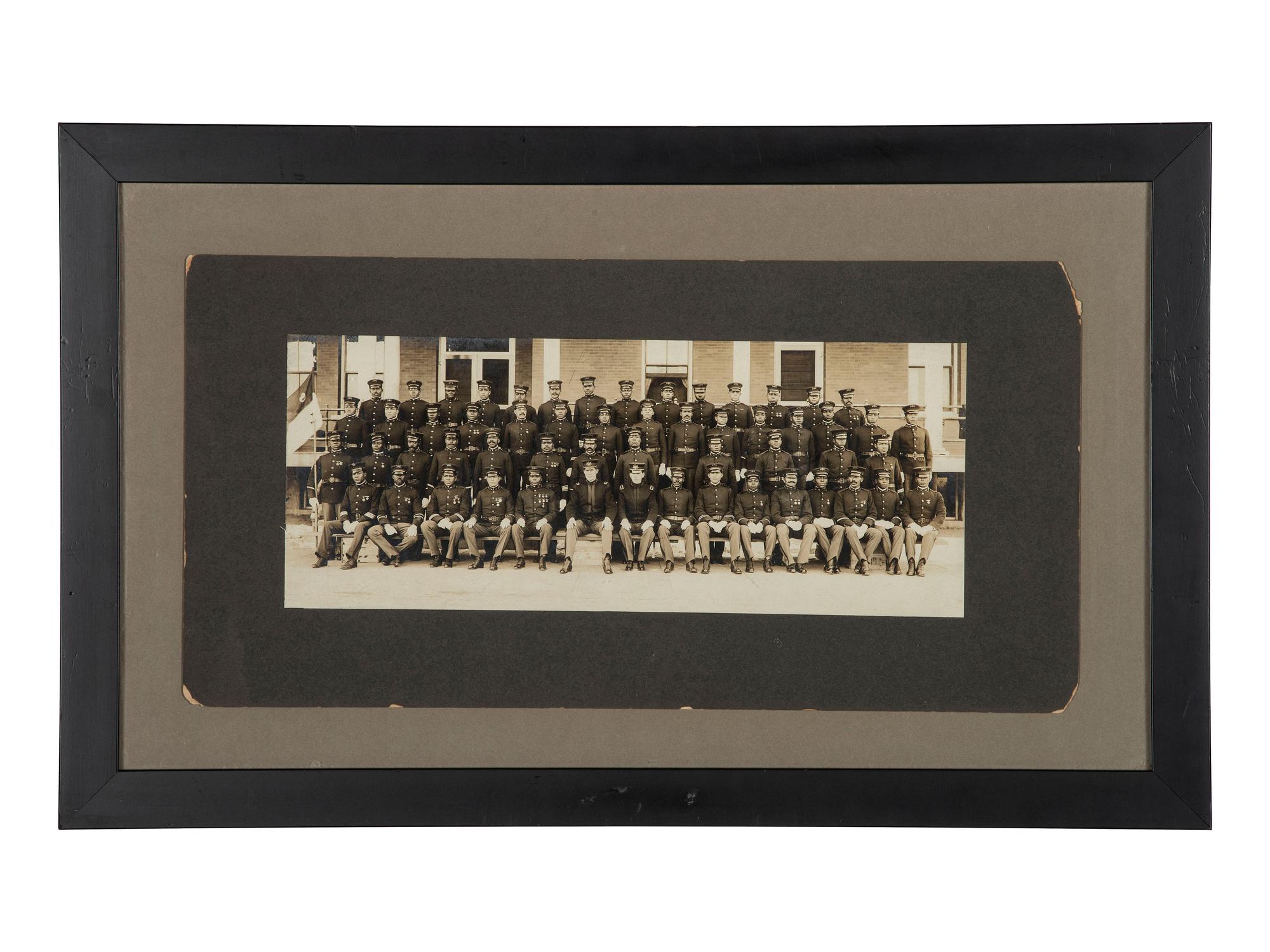 [BUFFALO SOLDIERS]. A group of 2 photographs of members of the 9th Cavalry, incl. Charles Young and George Prioleau. Fort D.A. Russell, Cheyenne, Wyoming, ca 1910s.