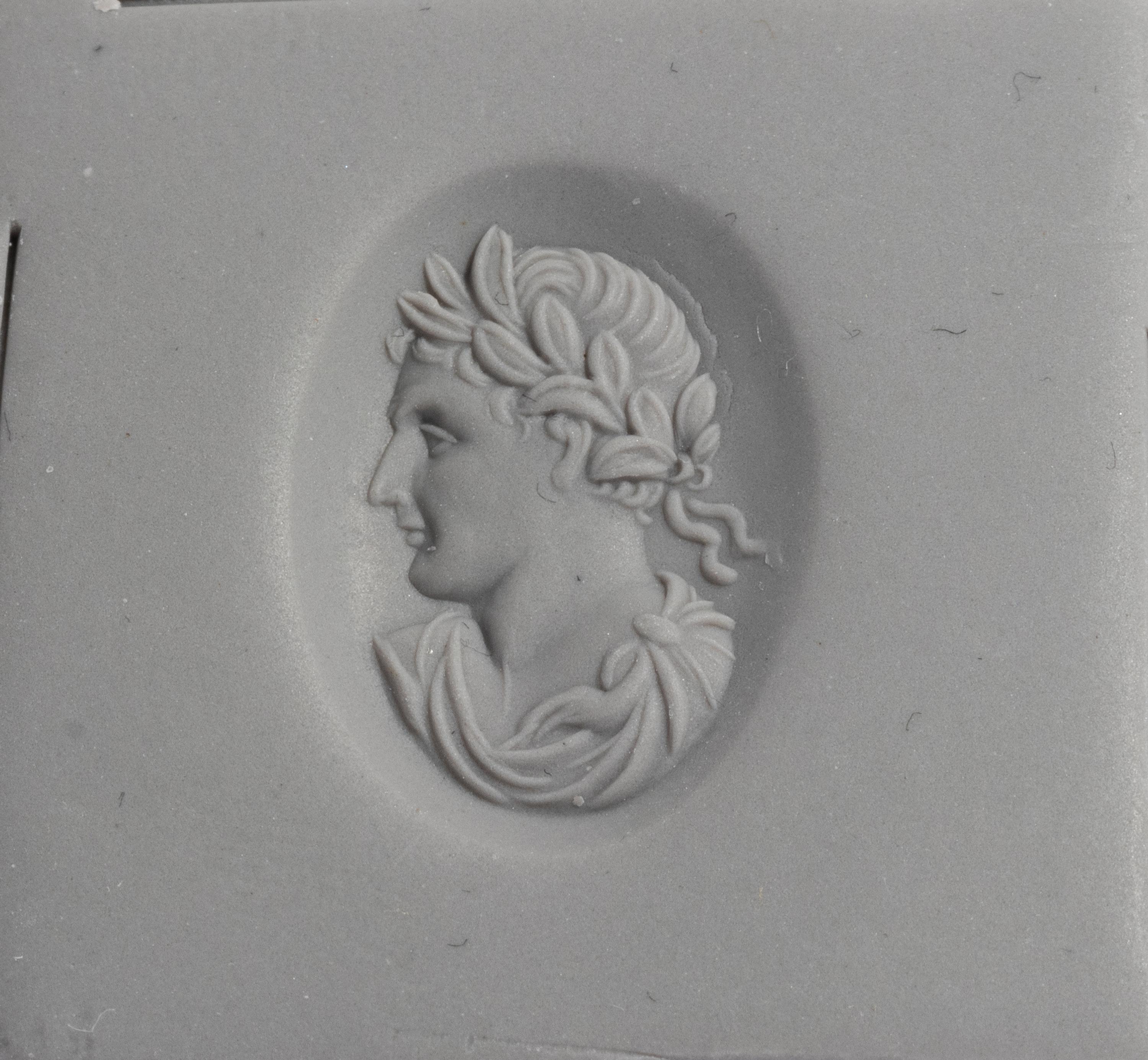A Neoclassical Banded Agate and Gold Stickpin with a Roman Emperor