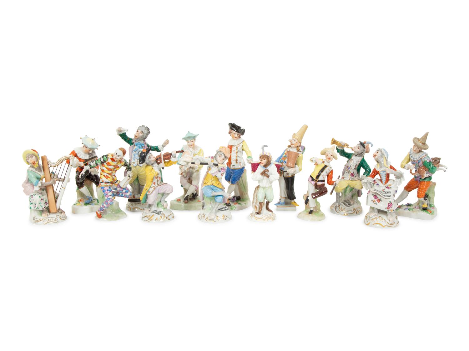 A Large Group of Meissen and Dresden Porcelain Figures