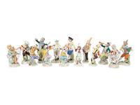 A Large Group of Meissen and Dresden Porcelain Figures