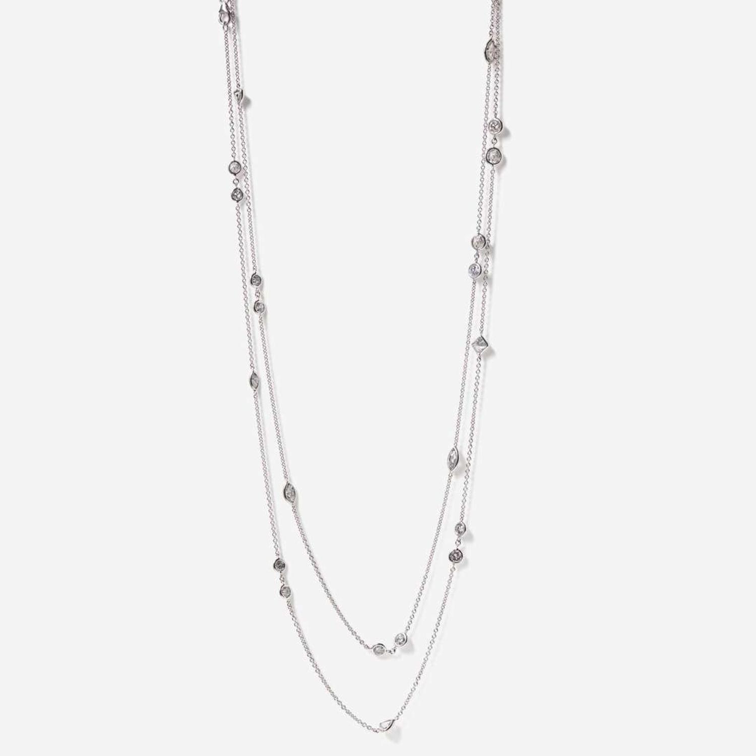 An 18K White Gold and Diamond Station Necklace