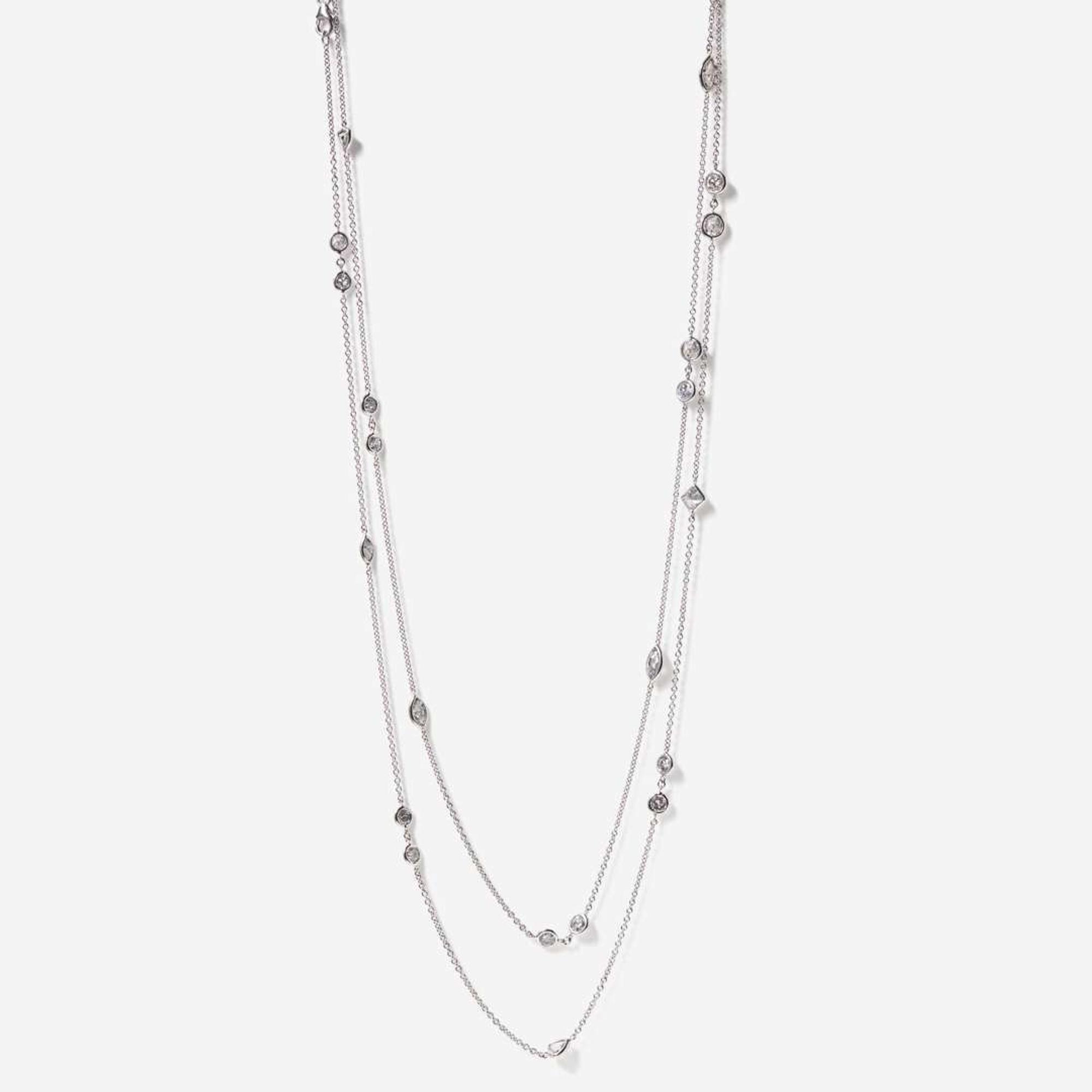 An 18K White Gold and Diamond Station Necklace