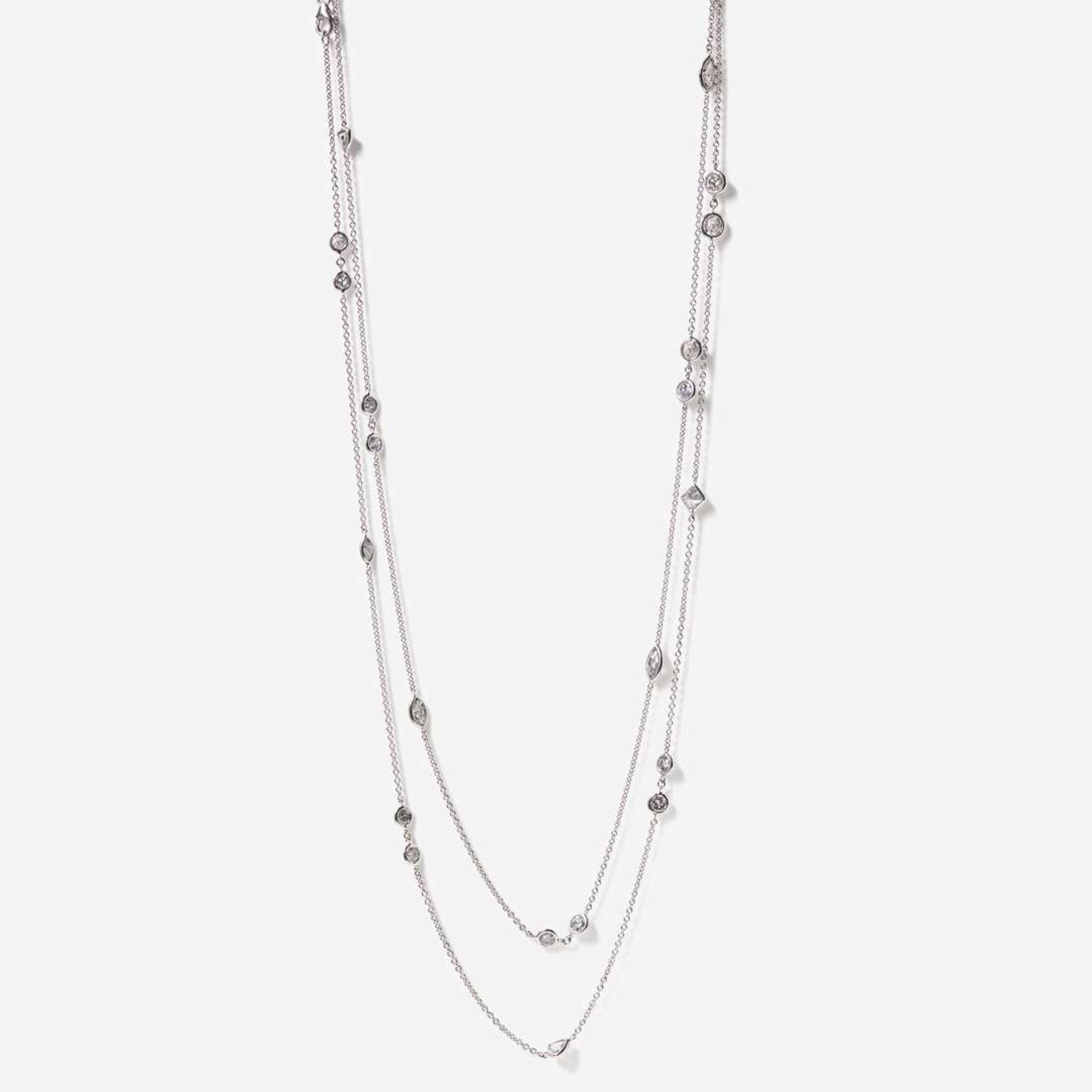 An 18K White Gold and Diamond Station Necklace