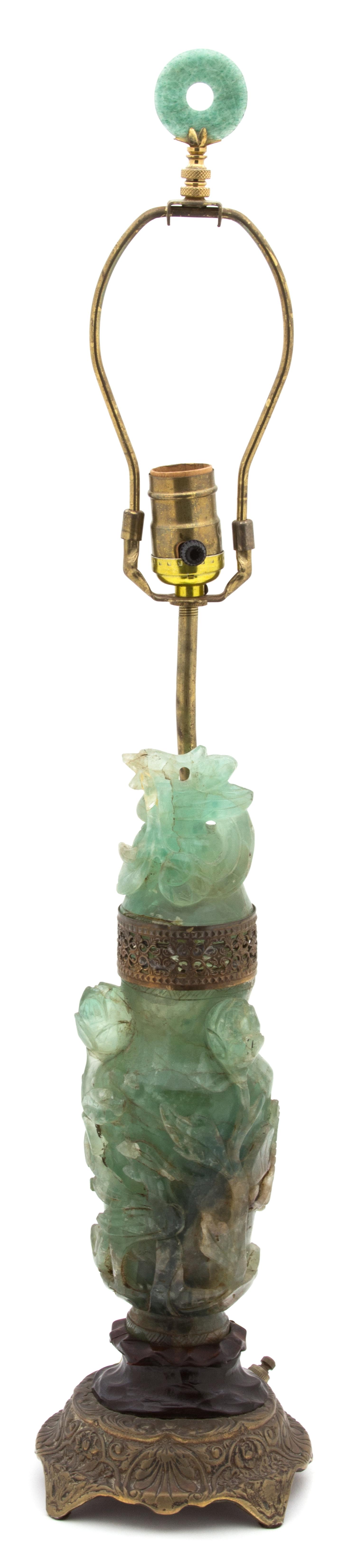 A Gilt Metal Mounted Carved Green Jadeite Covered Urn Height overall 28 inches, jade height 12 inches.