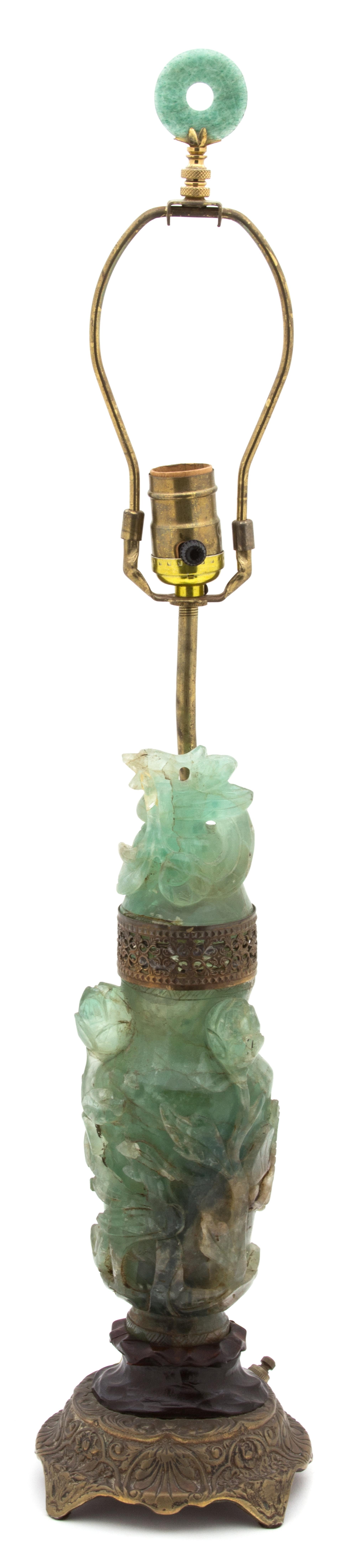 A Gilt Metal Mounted Carved Green Jadeite Covered Urn Height overall 28 inches, jade height 12 inches.