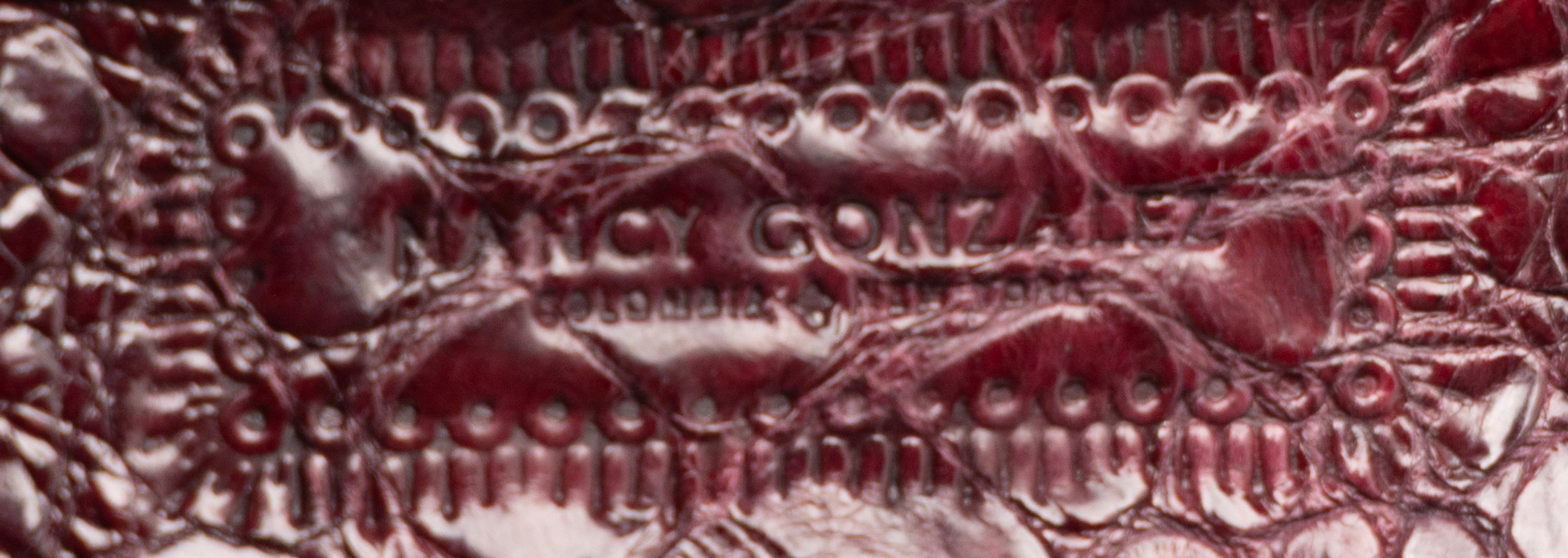 Nancy Gonzalez, Two Handbags